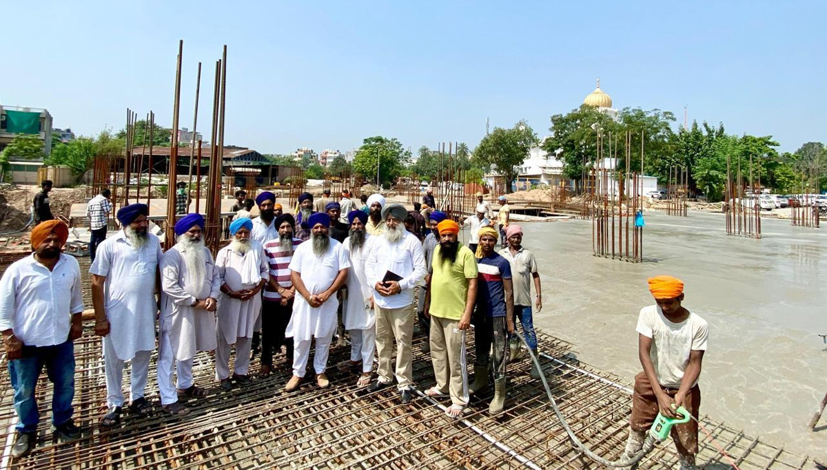 The lintel of the first floor of the multi-storey car parking being constructed at Gurdwara Singh Shaheedan was installed.